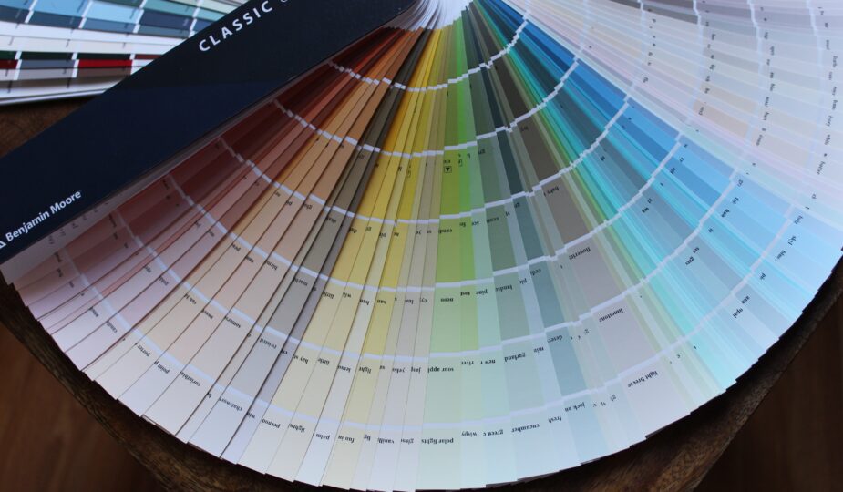 a fanned out stack of paint color samples