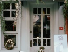 front of a flowery antique store