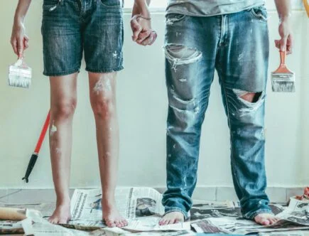 two people paintng